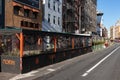 Row of Outdoor Dining Structures at Restaurants along a Street in Nolita of New York City during the Covid 19 Pandemic