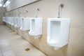 Row of outdoor urinals men public toilet Royalty Free Stock Photo