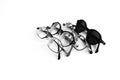 Row of eyeglasses and sunglasses isolated on white Royalty Free Stock Photo