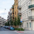 Row of parked cars and apartment buildings in the Lazarz district, Poland Royalty Free Stock Photo