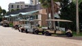 Row of parked golf carts Royalty Free Stock Photo