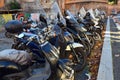 Row of parked mopeds Royalty Free Stock Photo