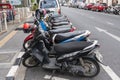 row of parked motorbikes on Talang's central street