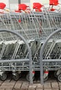 A row of parked shopping carts trolleys Royalty Free Stock Photo