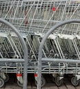 A row of parked shopping carts trolleys Royalty Free Stock Photo