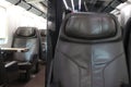 Row of Passenger`s brown leather seat of first class on high speed train, empty comfortable luxury vehicle chair, public transport
