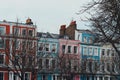 Row of pastel terraced houses in Primrose Hill, London, UK