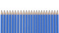 Row of pencils in blue color on white