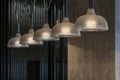 Row of pendant light lamps set in modern interior Royalty Free Stock Photo