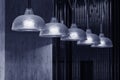 Row of pendant light lamps set in modern interior Royalty Free Stock Photo