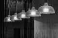 Row of pendant light lamps set in modern interior Royalty Free Stock Photo