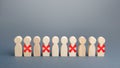 Row of people with red X. Reductions and work layoffs due to restrictive quarantine and pandemic. Loss of jobs and massive staff Royalty Free Stock Photo