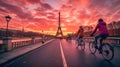A row of pink bicycles at a docking station in Paris with the iconic Eiffel Tower in the background, under a fiery Royalty Free Stock Photo
