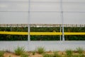 A row of plastic covered bow house tents for raspberry production Royalty Free Stock Photo