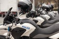 Row of new police motorbikes on the street Royalty Free Stock Photo