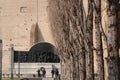 Row of poplar trees in Piazza della Pace in Parma, background with monument to Giuseppe Verdi Royalty Free Stock Photo