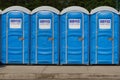 Row of Portable Toilets Royalty Free Stock Photo