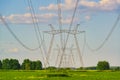 Row of power line supports Royalty Free Stock Photo