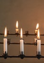 Stand of burning prayer candles in old church Royalty Free Stock Photo