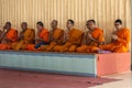 Row of praying Buddhist monks on Ko Samui Island, Thailand