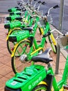 Lime Green e-Bikes Parked on Pavement, Sydney, Australia