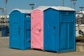 row of public portable mobile toilets on the street outdoor Royalty Free Stock Photo