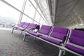 Row of purple chair at airport Royalty Free Stock Photo