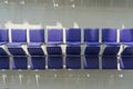 Row of purple chair interior at airport terminal waiting area decoration for modern building Royalty Free Stock Photo