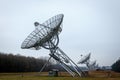 A row of radio telescope dishes Royalty Free Stock Photo