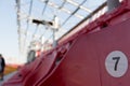 A row of red plastic chairs on a stadium Royalty Free Stock Photo