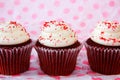 Row of red velvet cupcakes with red sprinkles Royalty Free Stock Photo