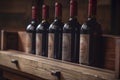 Row of red wine bottles on a wooden shelf, created with generative AI Royalty Free Stock Photo