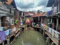 row of residential houses on the river in Indonesia. Royalty Free Stock Photo