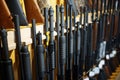 Row of rifles in gun shop closeup, nobody Royalty Free Stock Photo