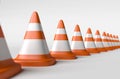 Row of road cones on a white background, depth of field