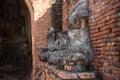 Row of ruin buddha statue in wat chai wattanaram, ayutthaya, thailand Royalty Free Stock Photo