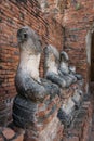 Row of ruin buddha statue in wat chai wattanaram, ayutthaya, thailand Royalty Free Stock Photo