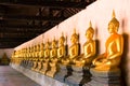 Row of sacred Buddha images in Putthaisawan Temple, Thailand Royalty Free Stock Photo