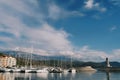 Row of sailing yachts are moored at Lustica Bay near the lighthouse. Montenegro