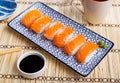 row salmon nigiri