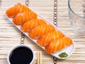 row salmon nigiri