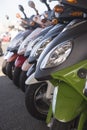 Row of scooters on the street Royalty Free Stock Photo