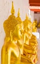 Row of seated Buddhas Royalty Free Stock Photo