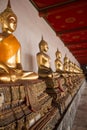 Row of seated Buddhas at the temple of Wat Arun in Bangkok Royalty Free Stock Photo