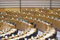 Row of seats at the Plenary Chamber at the European Parliament Royalty Free Stock Photo