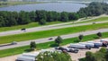 Row of semi-trucks, containers, cargo trailers parking lot Jackson County Rest Area West along Highway Intestate Royalty Free Stock Photo