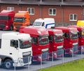 Row of Semi Trucks at Dealership Royalty Free Stock Photo