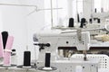 A row of sewing machine in tailor workplace Royalty Free Stock Photo