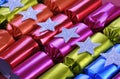 Row of shiny festive Christmas cracker bon bons Royalty Free Stock Photo