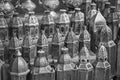 Row of shiny traditional coffee pots and lamp Royalty Free Stock Photo